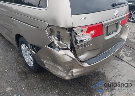 2010 Honda Odyssey Lx z USA, uszkodzony, nr VIN 5FNRL3H29AB009627